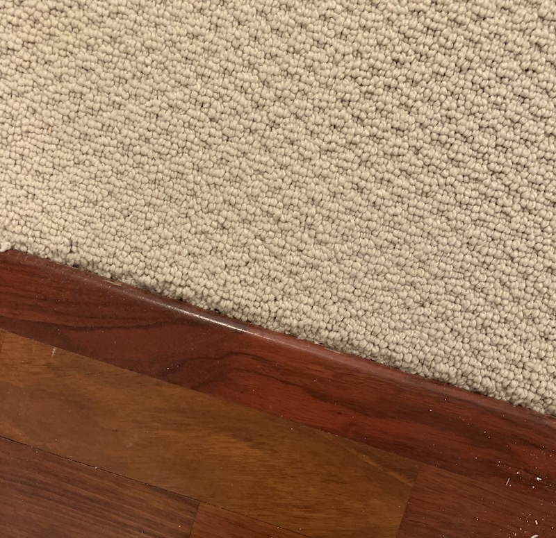 Carpet-and-Wood-Floors-Meeting-Up Everything You Need to Know | Replacing Our Carpets